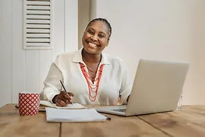 Smiling businesswoman, associated with state aid for child care centers in Canada and Ontario